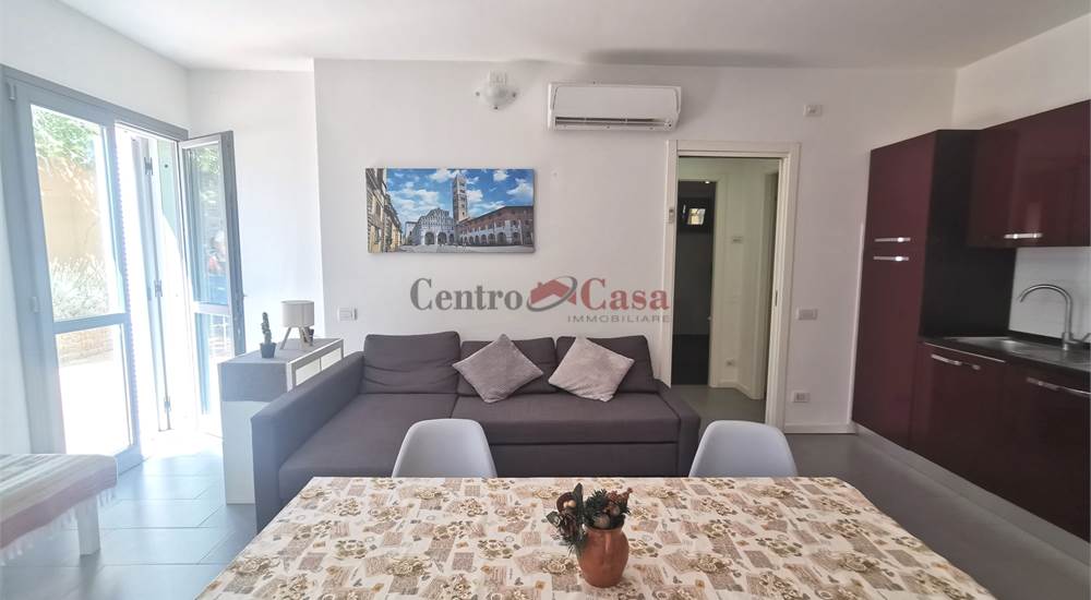Soggiorno con angolo cottura