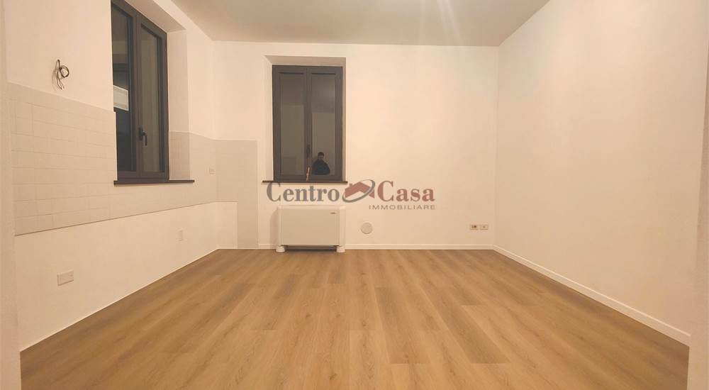 Soggiorno con angolo cottura