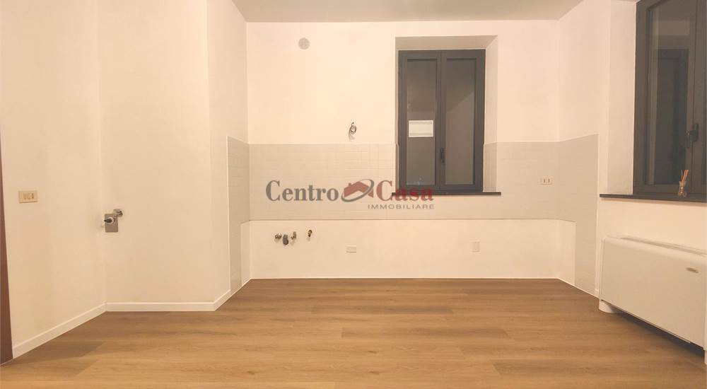 Soggiorno con angolo cottura