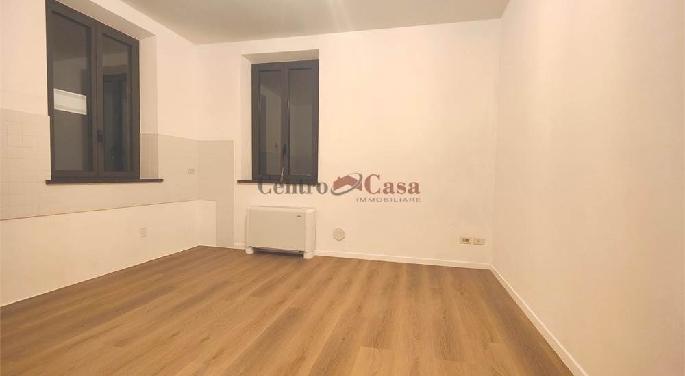 Soggiorno con angolo cottura