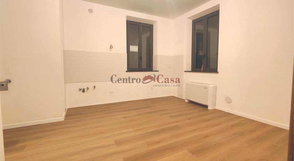 Soggiorno con angolo cottura